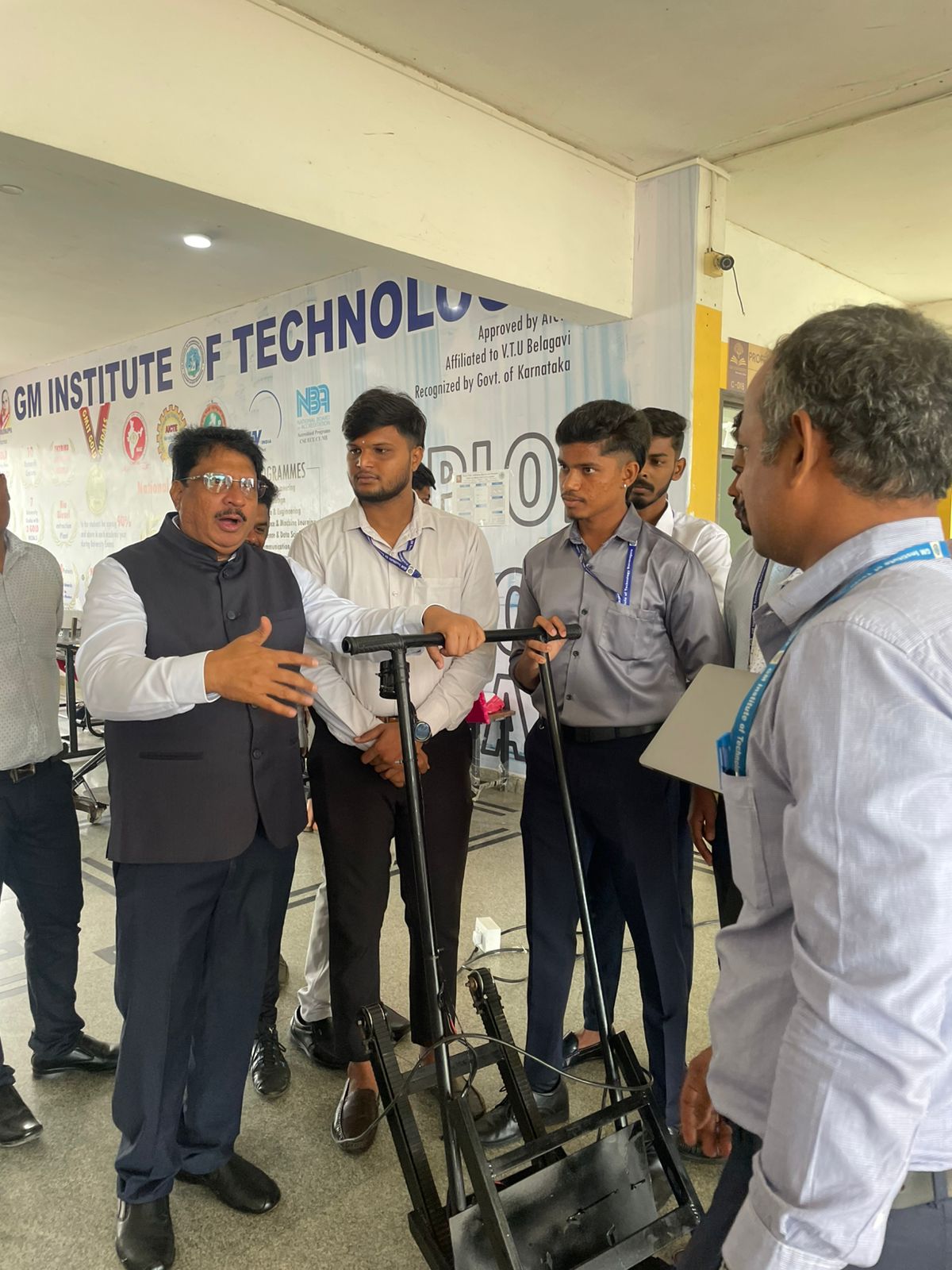 Faculty with Ph.D. scholars in lab